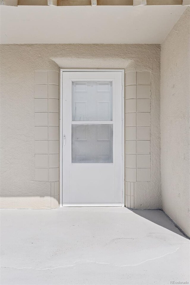 448 K Ave, Limon, CO 80828 - property entrance with stucco siding