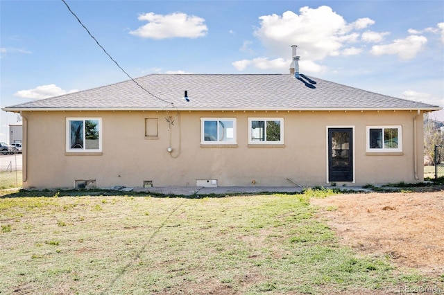 448 K Ave, Limon, CO 80828 - rear view of house with stucco siding and roof with shingles