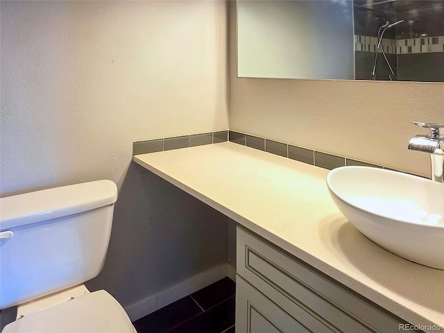 9650 Huron St Unit 3, Thornton, CO 80260 - bathroom featuring vanity, tile patterned floors, and a tile shower