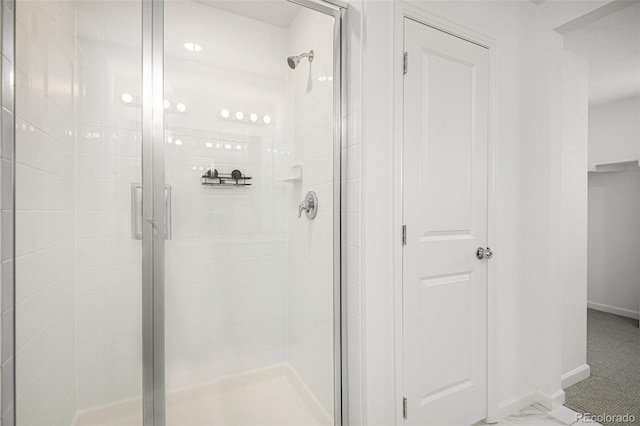 bathroom featuring walk in shower