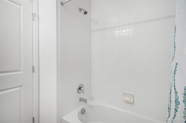 full bathroom featuring shower / bath combination with curtain
