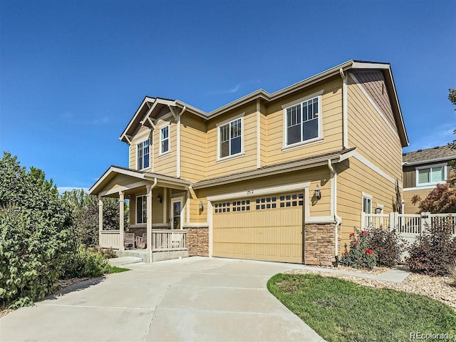 craftsman house featuring a garage and covered porch