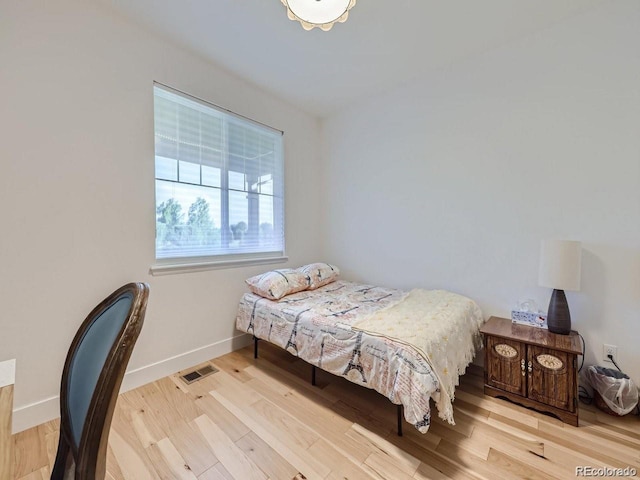 bedroom featuring light hardwood / wood-style floors