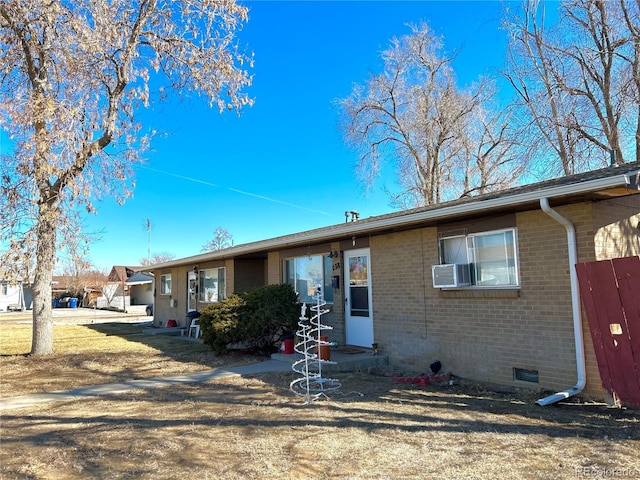 ranch-style home with crawl space and brick siding