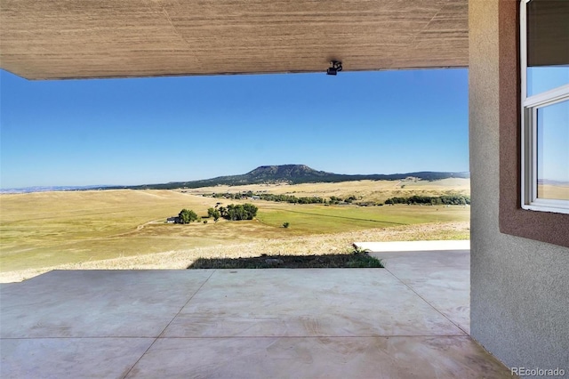 view of patio with a mountain view