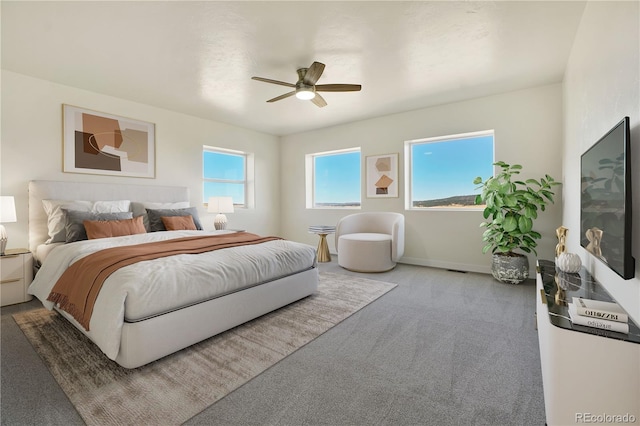 bedroom with carpet floors and ceiling fan