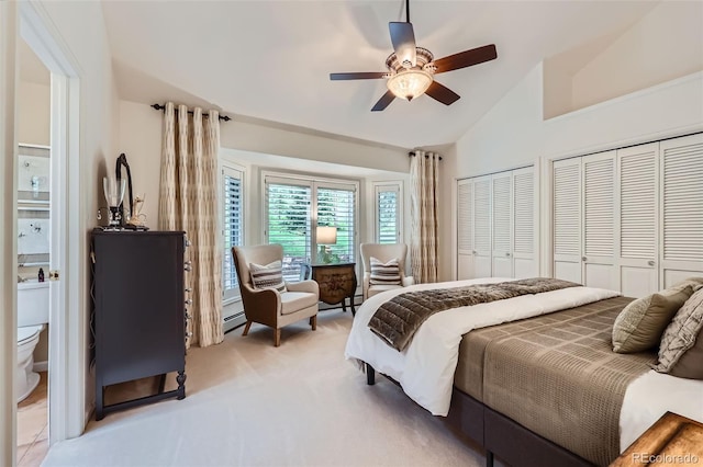 4856 Cheyenne Dr, Larkspur, CO 80118 - bedroom featuring lofted ceiling, two closets, light carpet, and a ceiling fan