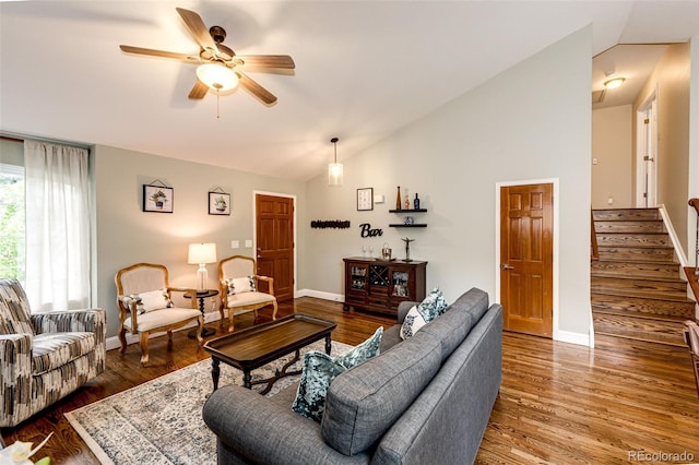 9846 Spring Hill Ln, Highlands Ranch, CO 80129 - living area with lofted ceiling, ceiling fan, wood finished floors, and stairs