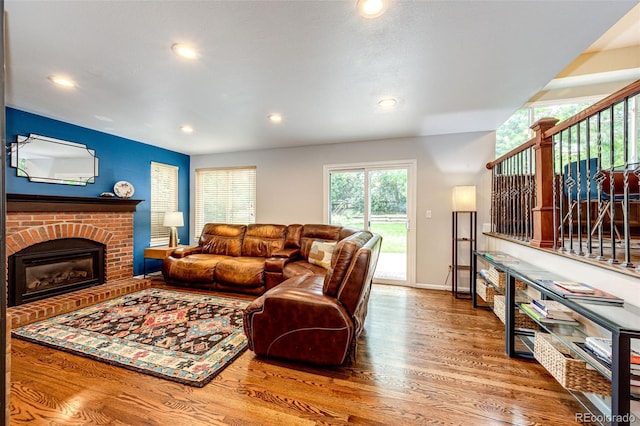 9846 Spring Hill Ln, Highlands Ranch, CO 80129 - living room with wood finished floors, recessed lighting, and a fireplace