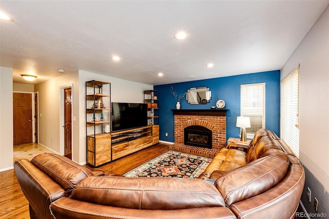 9846 Spring Hill Ln, Highlands Ranch, CO 80129 - living area featuring wood finished floors, recessed lighting, and a fireplace