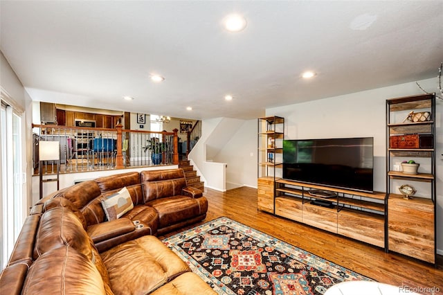9846 Spring Hill Ln, Highlands Ranch, CO 80129 - living room with stairs, wood finished floors, and recessed lighting