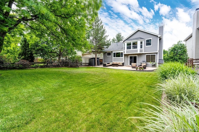 9846 Spring Hill Ln, Highlands Ranch, CO 80129 - rear view of property with a patio, outdoor lounge area, a chimney, and a shed