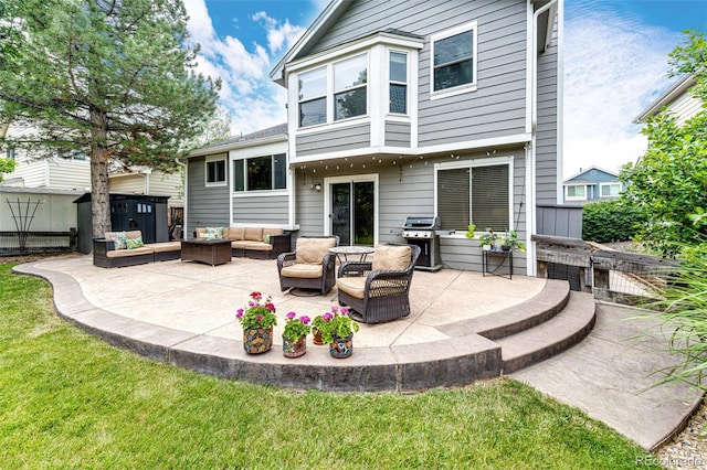 9846 Spring Hill Ln, Highlands Ranch, CO 80129 - rear view of property featuring an outdoor hangout area, a patio, a shed, and a lawn