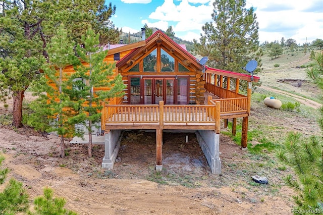 780 Oak St, Hartsel, CO 80449 - back of house featuring log exterior, a wooden deck, and french doors
