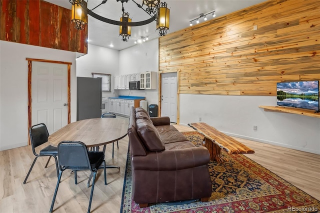 780 Oak St, Hartsel, CO 80449 - living area with light wood-style floors and a chandelier