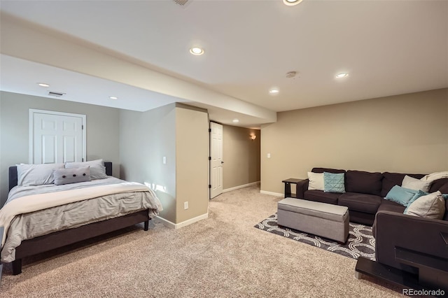 bedroom with light colored carpet