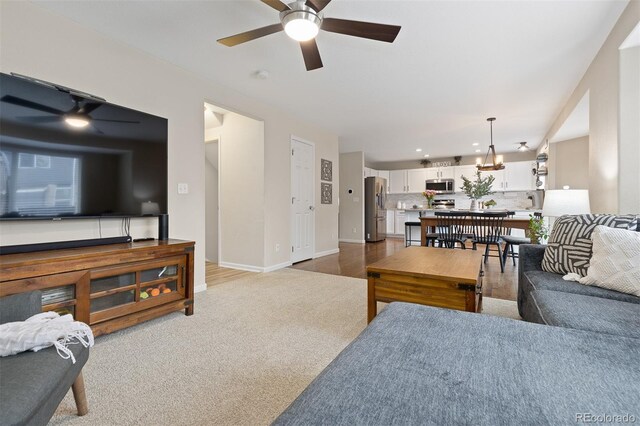 2763 Dharma Ave, Broomfield, CO 80020 - living room featuring ceiling fan and carpet