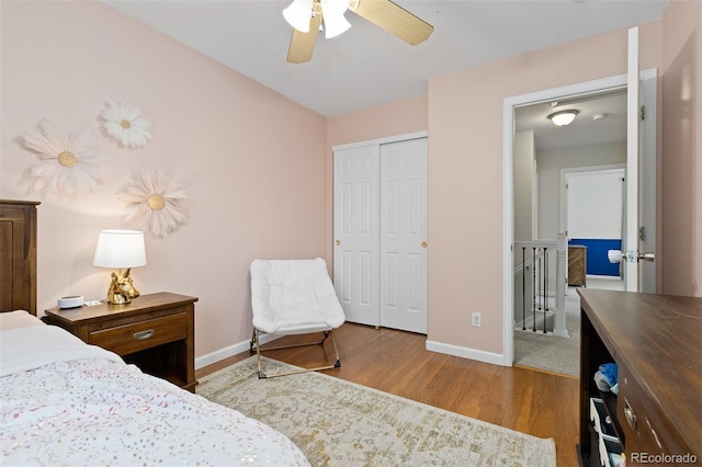 2763 Dharma Ave, Broomfield, CO 80020 - bedroom featuring wood finished floors, a closet, and a ceiling fan