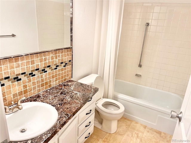 full bathroom featuring decorative backsplash, toilet, vanity, and shower / bath combo with shower curtain