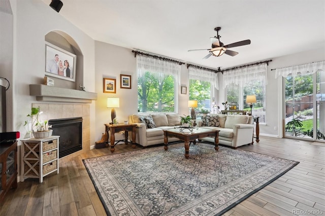 1488 Baguette Dr, Castle Rock, CO 80108 - living area with ceiling fan, hardwood / wood-style flooring, and a tile fireplace