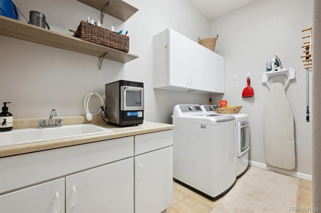 1488 Baguette Dr, Castle Rock, CO 80108 - laundry room featuring separate washer and dryer and cabinet space