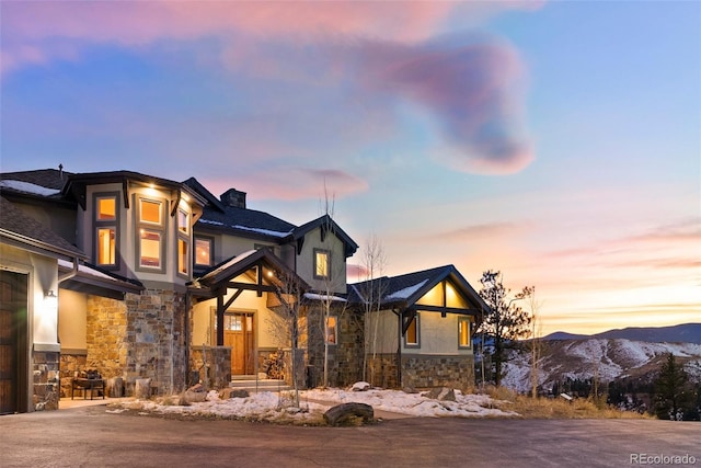 view of front of property with a mountain view