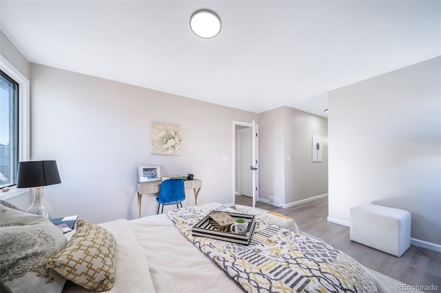 bedroom featuring light wood-type flooring