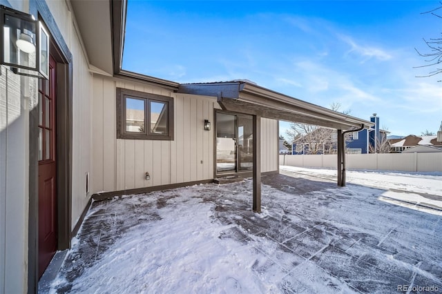 view of snow covered patio