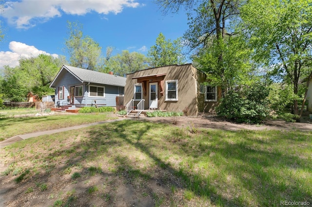 924 E Saint Vrain St, Colorado Springs, CO 80903 - view of front of home with a front lawn
