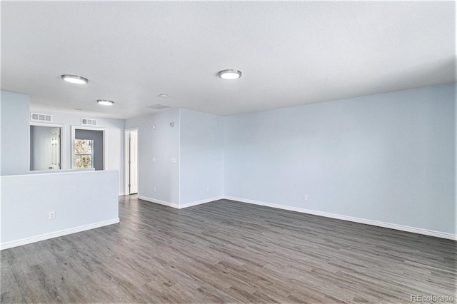 1963 Hogan Ct, Castle Rock, CO 80109 - spare room featuring wood finished floors and baseboards