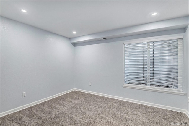 1963 Hogan Ct, Castle Rock, CO 80109 - spare room featuring carpet flooring, recessed lighting, and baseboards