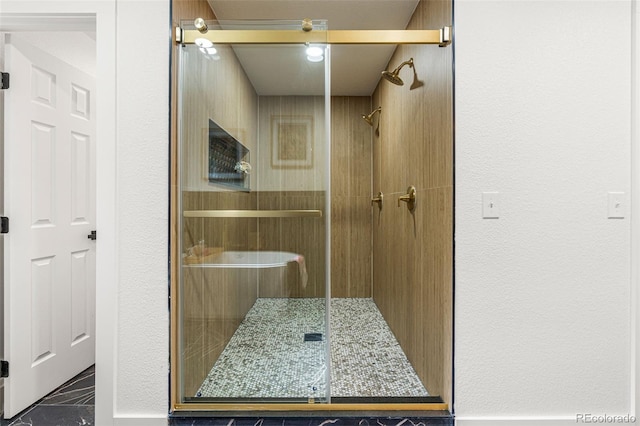 bathroom with an enclosed shower