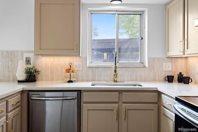 5667 S Lowell Blvd, Littleton, CO 80123 - kitchen with stainless steel dishwasher, a sink, and gray cabinets