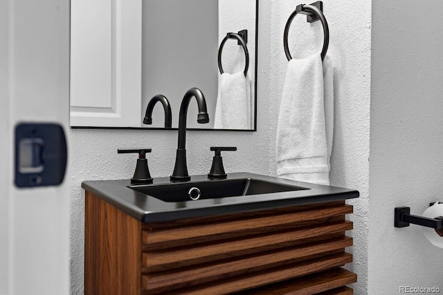 5667 S Lowell Blvd, Littleton, CO 80123 - bathroom view of a sink and a textured wall