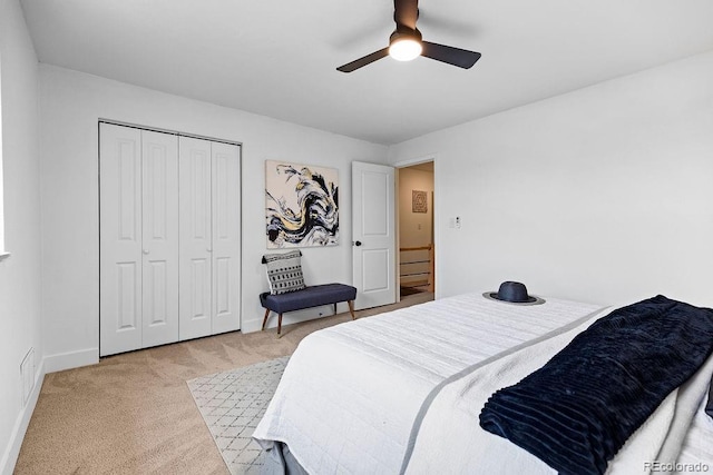 5667 S Lowell Blvd, Littleton, CO 80123 - bedroom with light colored carpet, baseboards, a closet, and a ceiling fan