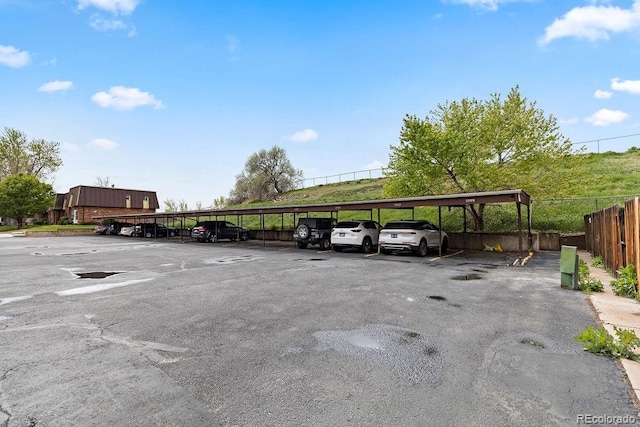 5667 S Lowell Blvd, Littleton, CO 80123 - covered parking lot featuring fence