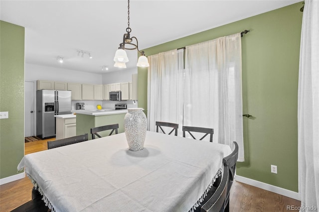 1464 Spotted Owl Way, Highlands Ranch, CO 80129 - dining space with wood finished floors