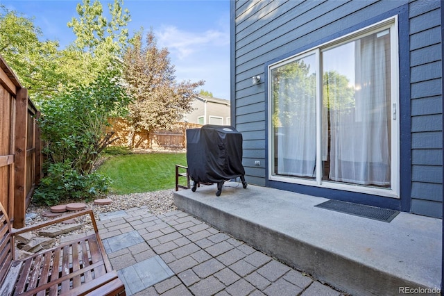 1464 Spotted Owl Way, Highlands Ranch, CO 80129 - fenced backyard featuring area for grilling and a patio area