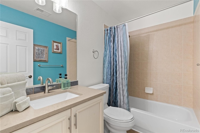 bathroom featuring toilet, shower / bath combo, visible vents, and vanity