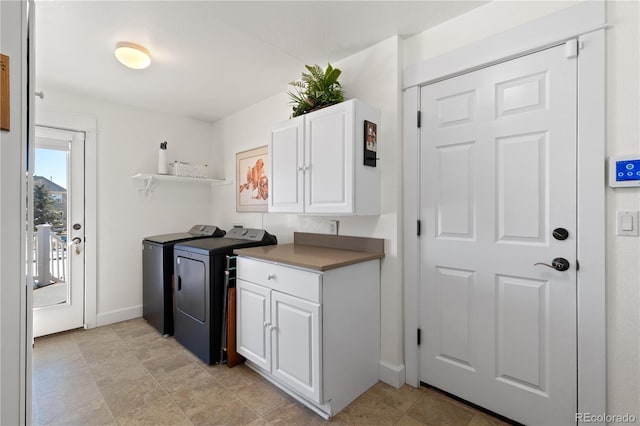 kitchen featuring white cabinetry, open shelves, baseboards, and separate washer and dryer