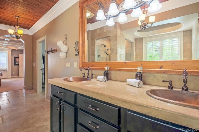 bathroom featuring a tile shower, a chandelier, wooden ceiling, and a sink