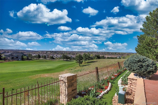view of yard featuring view of golf course