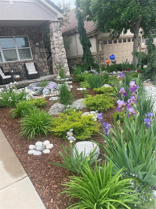 view of yard featuring an attached garage