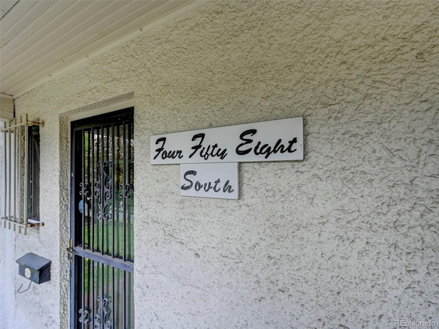 458 S Downing St, Denver, CO 80209 - property entrance featuring stucco siding