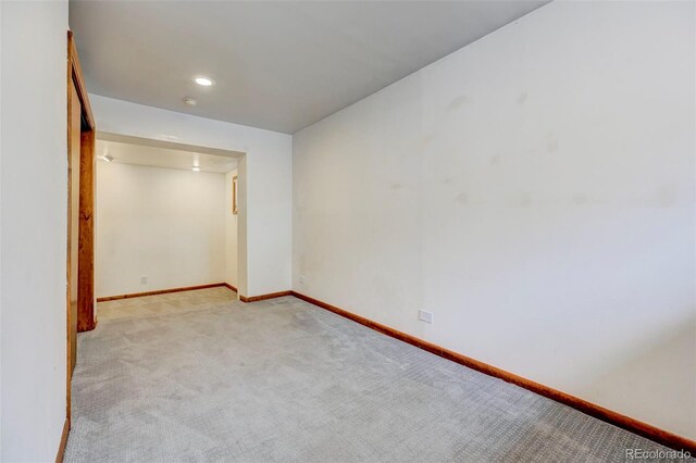 458 S Downing St, Denver, CO 80209 - carpeted empty room with baseboards and recessed lighting