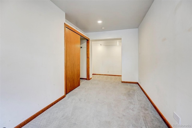458 S Downing St, Denver, CO 80209 - hallway featuring light colored carpet and baseboards