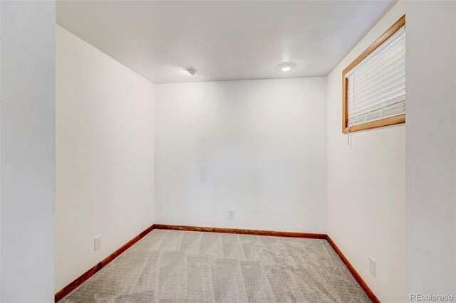 458 S Downing St, Denver, CO 80209 - unfurnished room featuring baseboards and carpet