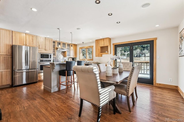 dining room featuring dark hardwood / wood-style flooring