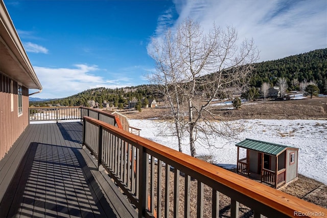 view of snow covered deck