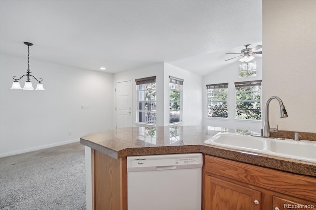 kitchen with sink, light carpet, dishwasher, and a wealth of natural light